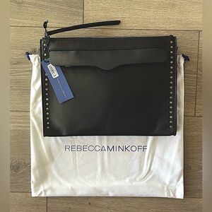 NWT Rebecca Minkoff Black Leather Travel Pouch/Wristlet. Comes with Dust Bag.
